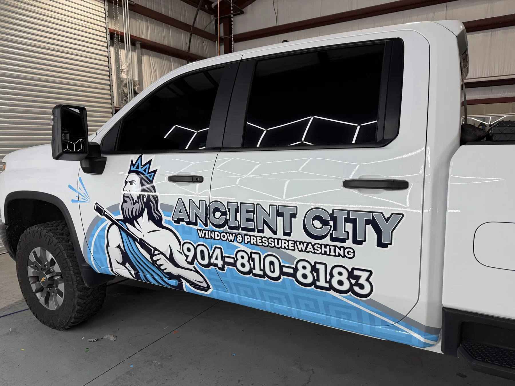 Ancient City pressure washing truck graphics