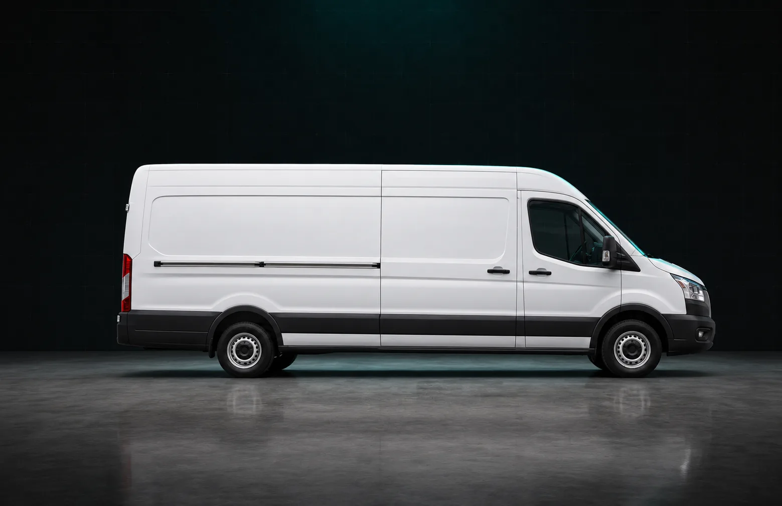 Plain unwrapped white cargo van in a dark studio